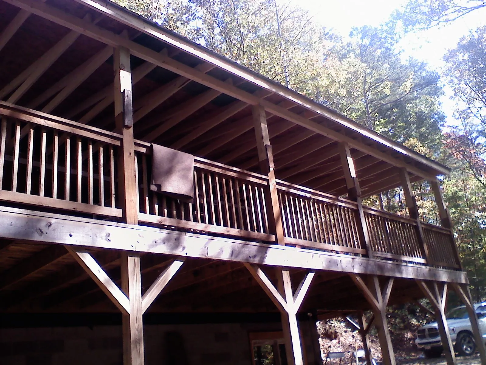 Timber framing under a new elevated porch and deck — Roof Leak Repair in East Haddam by Roofing Brothers